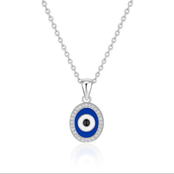 Silver necklace with a blue and black evil eye pendant on a white background